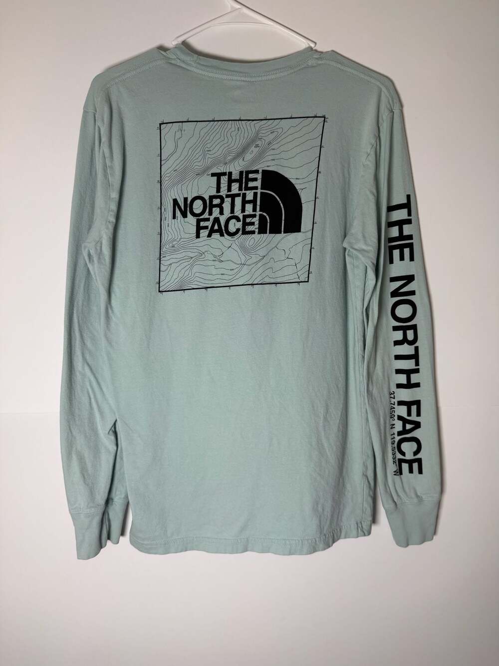 The North Face Long Sleeve Top with Topographic Map Design and Arm Logo
